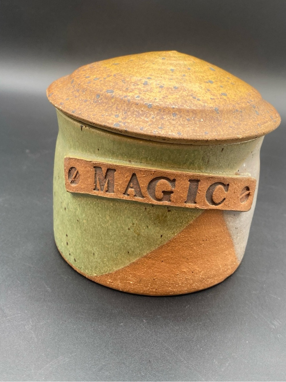 Ceramic Jar in Green blue and Terracotta with Branded “Magic”plaque